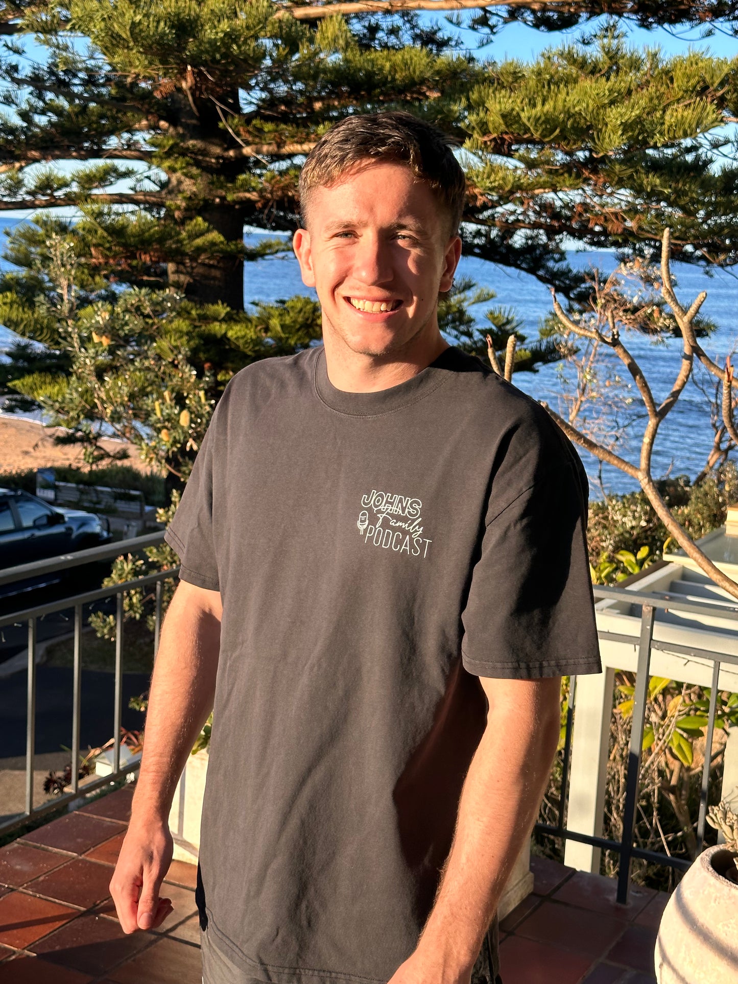 Faded Black Johns Family Podcast Logo Tee |